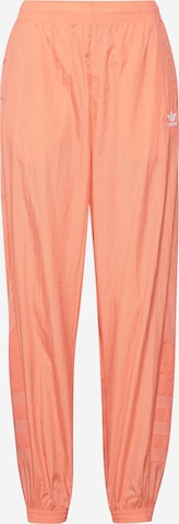 ADIDAS ORIGINALS Tapered Broek in Oranje: voorkant