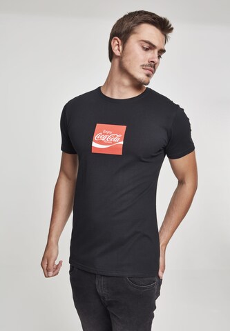 Mister Tee T-Shirt 'Coca Cola Taste The Feeling' in Schwarz: predná strana