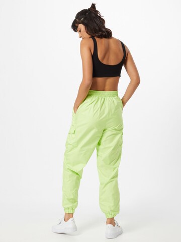 Tapered Pantaloni cu buzunare de la PUMA pe verde