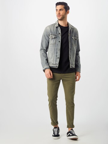 Slimfit Pantaloni eleganți 'XX Chino Slim Tapered' de la LEVI'S ® pe verde