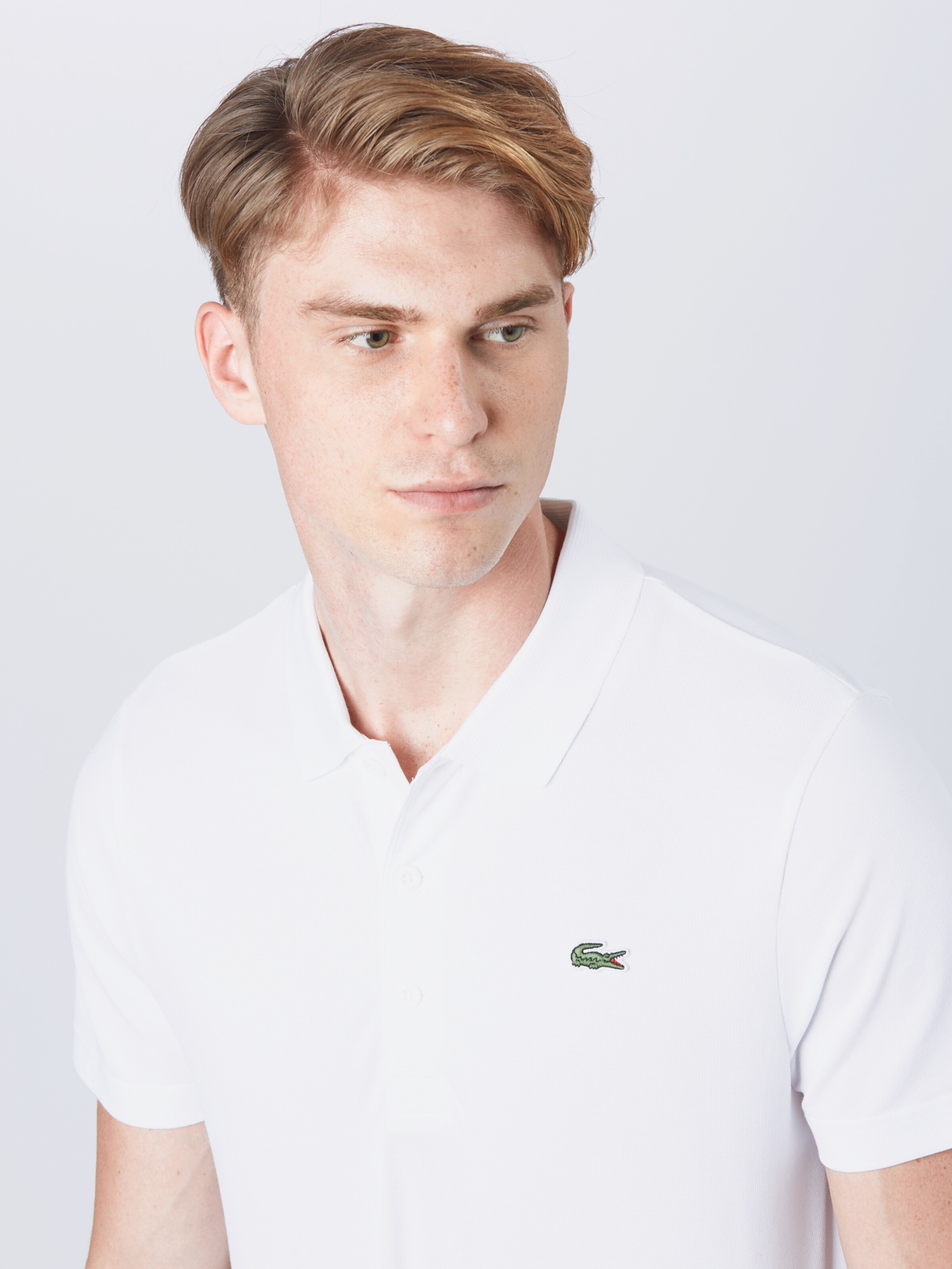 Promos T-Shirt fonctionnel Ottoman Lacoste Sport en Blanc 