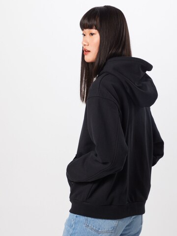 LEVI'S ® Dressipluus 'Standard Hoodie', värv must: tagant vaates