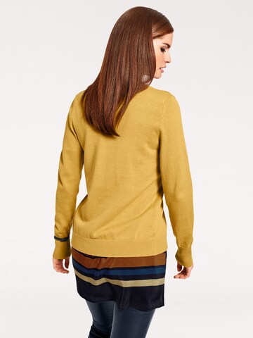 Cardigan heine en jaune : derrière