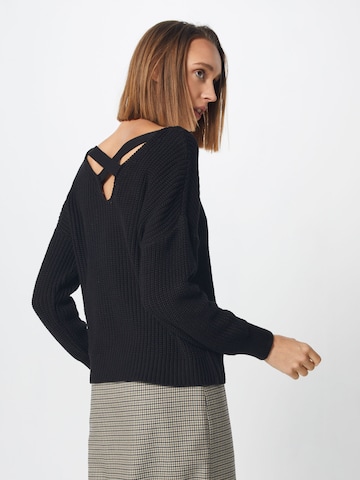 Pull-over 'Liliana' ABOUT YOU en noir : derrière