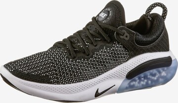 Chaussure de course NIKE en noir : devant