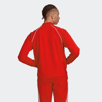 ADIDAS ORIGINALS Regular Fit Sweatjakke 'Adicolor Classics Primeblue' i rød