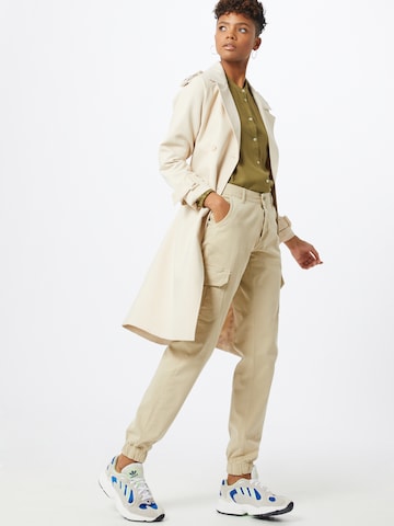 Tapered Pantaloni cargo di Urban Classics in beige