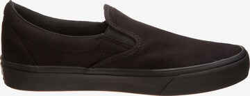 Scarpa slip-on di VANS in nero