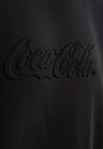 Sweat-shirt 'Coca Cola' Mister Tee en noir