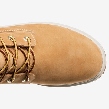 TIMBERLAND - Botas con cordones en amarillo