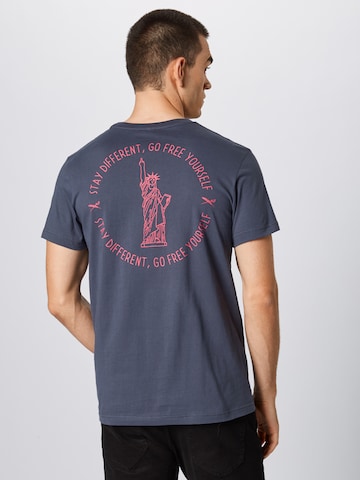 Iriedaily Shirt 'Liberteria Tee' in Blau: zadná strana