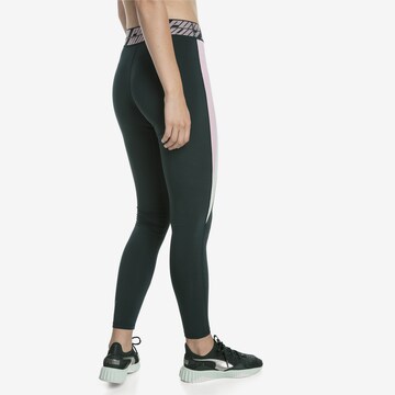 Skinny Pantalon de sport 'Own It' PUMA en vert