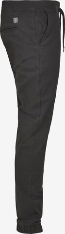 Tapered Pantaloni di SOUTHPOLE in nero