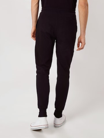 ELLESSE Tapered Byxa 'Nioro' i svart