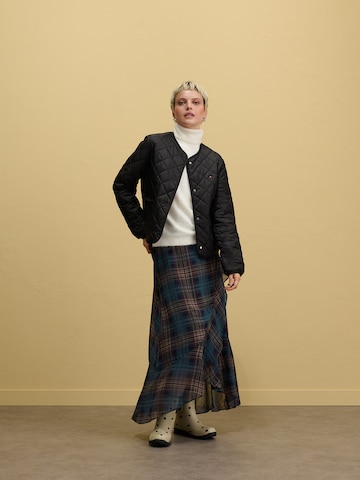 Black Quilted Jacket and Plaid Skirt Look