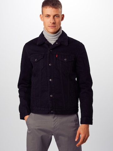 LEVI'S ® Between-season jacket 'Type 3 Sherpa Trucker' in Black: front