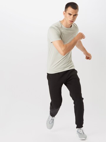 Champion Authentic Athletic Apparel Tapered Broek in Zwart