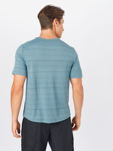 NIKE Functioneel shirt 'Miler' in Blauw