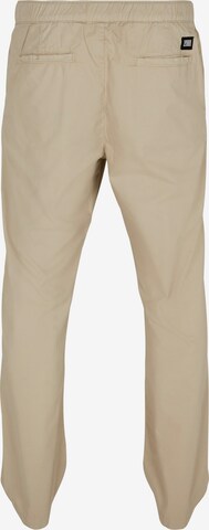 Effilé Pantalon chino Urban Classics en beige