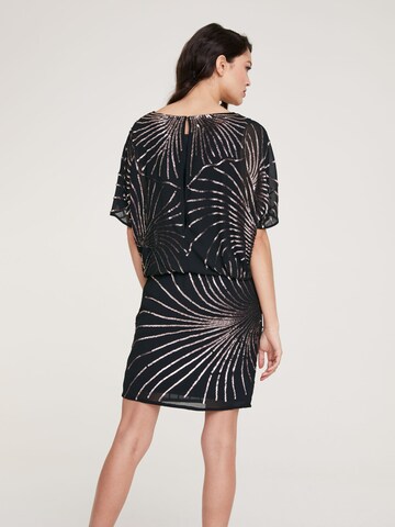 Rochie de cocktail de la heine pe negru