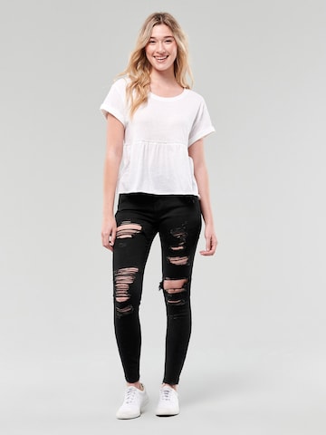 HOLLISTER Skinny Kavbojke | črna barva