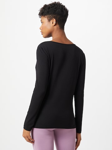 CURARE Yogawear Funkcionalna majica | črna barva