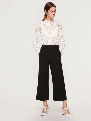 EDITED - Pierna ancha Pantalón 'Alexia' en negro