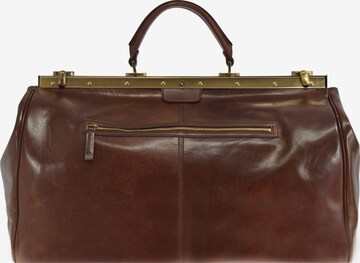 The Bridge Travel Bag in Brown: front