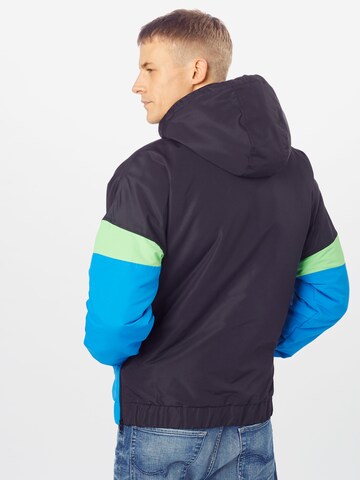 Veste mi-saison Urban Classics en bleu : derrière