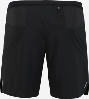 NIKE Regular Workout Pants 'Flex Stride' in Black