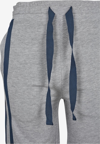 Urban Classics Zvonové kalhoty Kalhoty – šedá