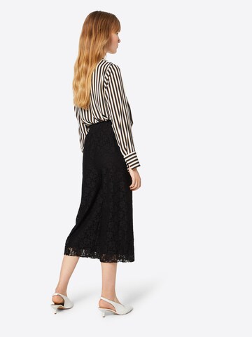 Urban Classics - Pierna ancha Pantalón en negro: atrás
