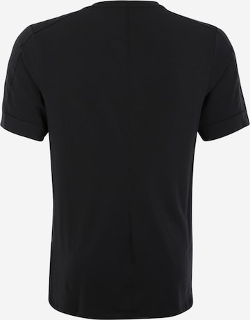 NIKE - Ajuste regular Camiseta funcional en negro