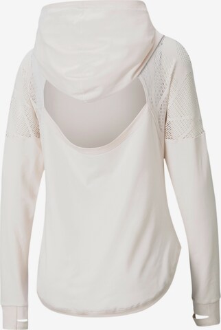 PUMASportska sweater majica 'Studio Lace' - roza boja: prednji dio