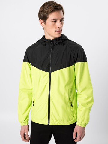 Veste mi-saison Urban Classics en jaune : devant