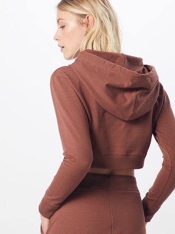 ABOUT YOU Limited Sweatshirt 'Sarina' in Brown: side