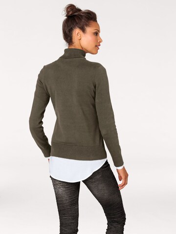 Pull-over heine en vert : derrière