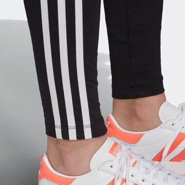 ADIDAS ORIGINALS Skinny Leggingsit 'Adicolor' värissä musta