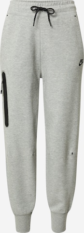 Nike Sportswear Avsmalnet Bukse 'Tech Fleece' i grå: forside