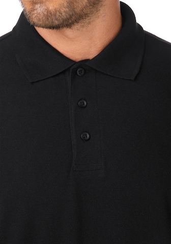 Man's World Poloshirt in Schwarz