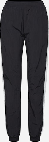 Urban Classics - Tapered Pantalón en negro: frente