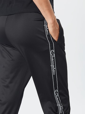 Effilé Pantalon de sport Champion Authentic Athletic Apparel en noir