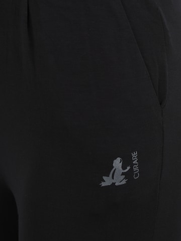 Effilé Pantalon de sport CURARE Yogawear en noir