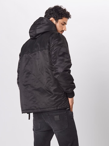 Coupe regular Veste mi-saison ALPHA INDUSTRIES en noir : derrière