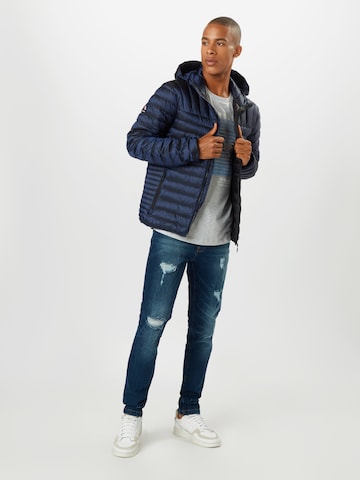 Coupe regular Veste d’hiver Superdry en bleu