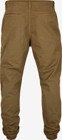 Tapered Pantaloni cargo di Urban Classics in verde