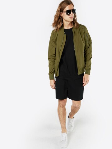 Veste mi-saison Urban Classics en vert