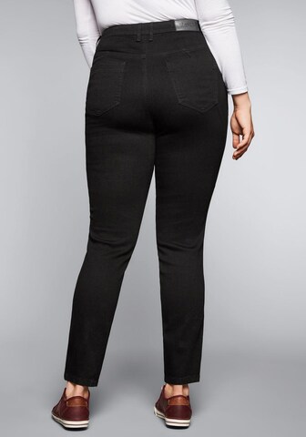 SHEEGO Skinny Jeans in Schwarz