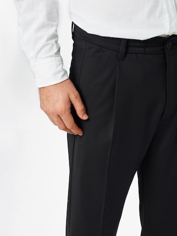 DRYKORN Regular Pleat-Front Pants 'Chasy' in Black