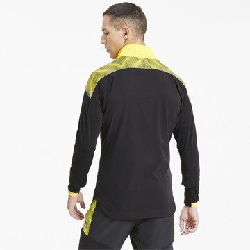 PUMA Fußballjacke in Schwarz
